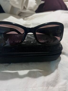 Calvin Klein Woman’s Reading Black Frame Sunglasses with Pink-Tinted Lenses